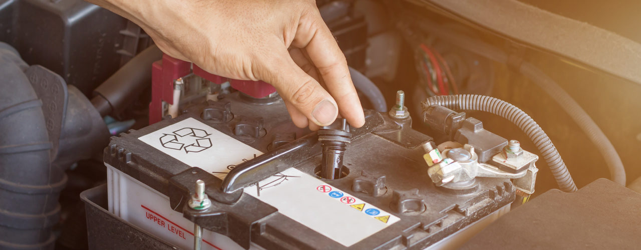 Tow-Tech-Performing-Car-Jump-Start-Service-On-Battery