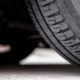 Closeup of tread tires on pavement
