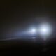 defocused-alone-minivan-moving-empty-night-foggy-road